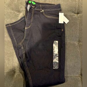 Brand new women’s skinny, mid rise. Jeans, dark rinse.